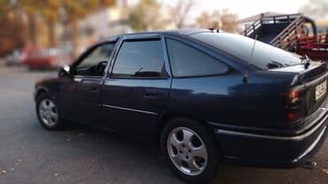фольксваген гольф 1 6: Opel Vectra A liftback (5 qapı), tünd mavi rəng. Texniki — 5