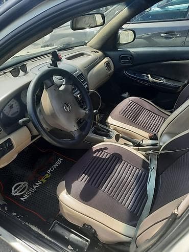 megan 3: Nissan Sunny: 1.3 l | 2006 il Sedan — 6