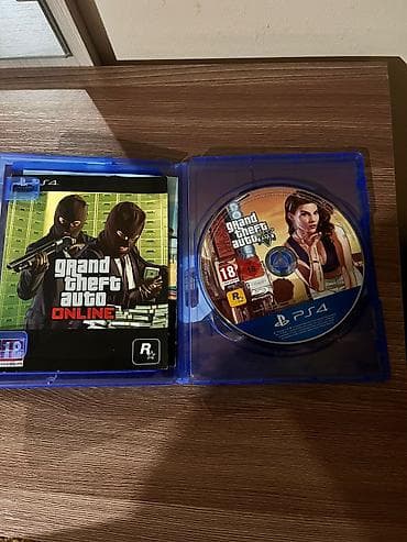 Digər oyun və konsollar: PS4 oyun diskləri – Grand Theft Auto V + Watch Dogs (Signature — 3