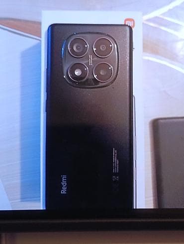 a 10 s: Xiaomi Redmi smartfon - Rəng: qara, mat gövdə - Arxa kamera bloku — 1