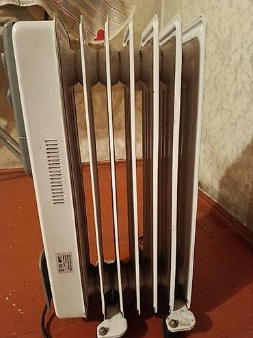 Yağlı radiator (elektrikli) – 5 seksiyalı Xüsusiyyətlər: - Elektriklə