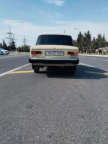 traktor diski: VAZ 2101 sedan - Kuzov: bej rəng, 4 qapı, xrom ön-arxa bamperlər — 3
