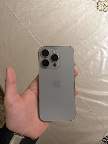 usaq kamera: IPhone 15 Pro, Natural Titanium, Face ID — 1