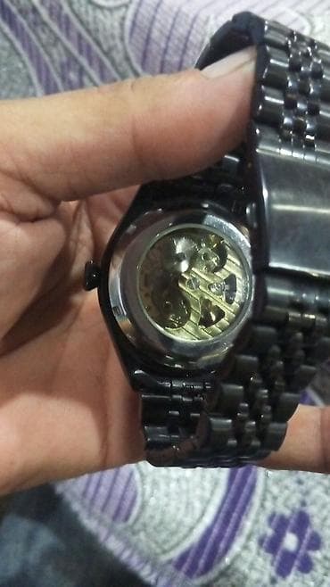 nomrəli saat: Mexanik skelet saat – qara metal korpus və qolbaq qiymet 70 manat — 1