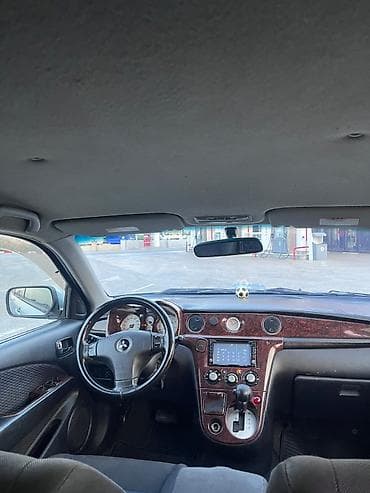 sam diskiler: Mitsubishi Airtrek (RHD) – şəhər və uzun yol üçün komfortlu krossover — 1