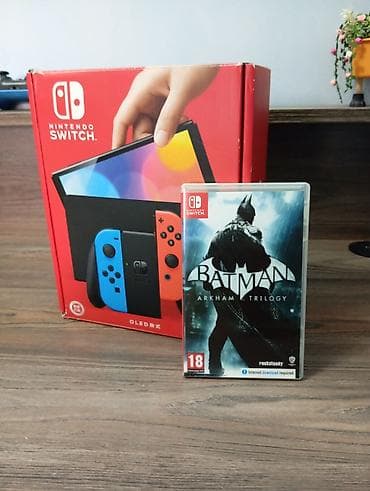 video dvd: Nintendo Switch OLED (neon mavi/qırmızı Joy‑Con) + Batman: Arkham — 1