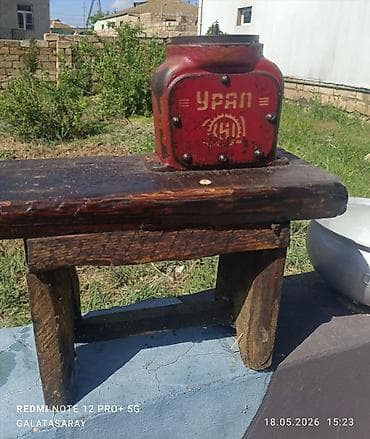Qədimi süd masinkasi