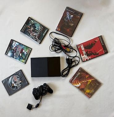 playstatio: PlayStation 2 oyun konsolu dəsti. Dəstə şəkildə görünənlər daxildir — 1