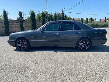 03 masin: Mercedes-Benz E 230: 2.3 l | Sedan — 5