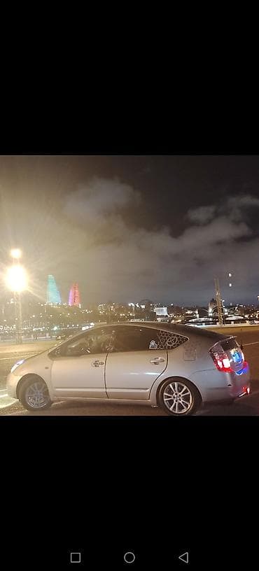 07 disk: Toyota Prius hibrid sedan - Kuzov: gümüş rəng, 5 qapı, aerodinamik — 1