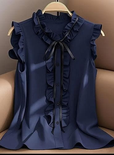 mayka modelleri: Qadın bluzu – qolsuz, tünd göy rəngdə, romantik volan detalları ilə — 1