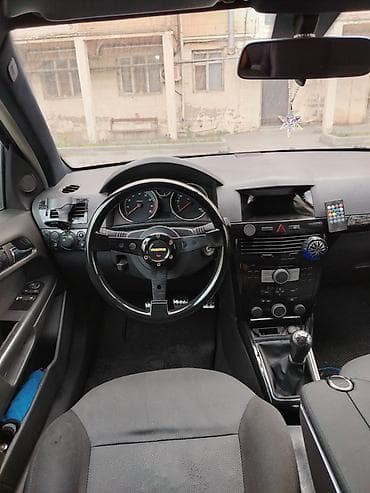 doogee dg550 dagger: Opel Astra: 1.6 l | Hetçbek — 4