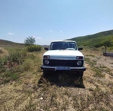 nissan tiida yan guzgu: VAZ (LADA) 4x4 Niva: 1.7 l | 1999 il 153624 km Sedan — 1