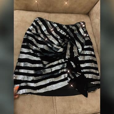 çiçəkli ətəklər: Tezedi geyinilmeyib, cox gozeldi, Satilir. 50 manata alinib. Marka — 3