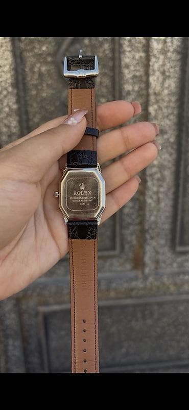 qol saat sekilleri: Klassik üslubda qol saatı - Marka: Rolex (korpus arxasında “Stainless — 1
