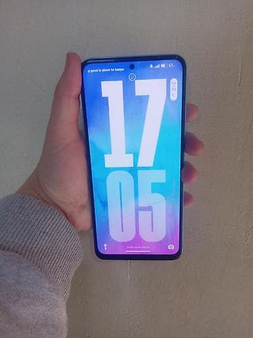 Redmi smartfon - Rəng: Göy - Ekran: Tam ekran dizayn, mərkəzdə