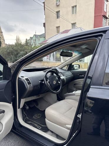 renault twizy azerbaycan: Toyota Prius (2-ci nəsil) hibrid hetçbek - Güc qurğusu: benzin — 6