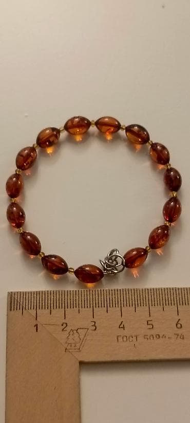 Наручные часы: Təbii Baltik kəhrabasından “Zeytun” formalı bilərzik - Material — 5