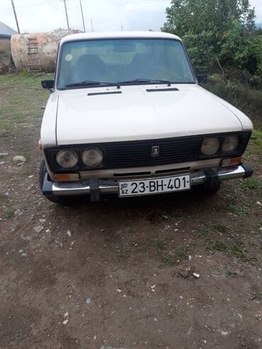 mersedes disk r15: VAZ 2106 sedan Xüsusiyyətlər: - Korrektorlu dörd dairəvi ön fara — 1