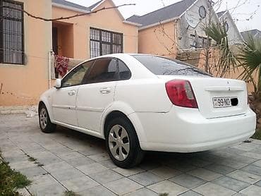 teker cixardan: Daewoo Gentra: 1.5 l | 2014 il Sedan — 4