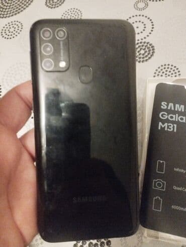 samsung s24 mini qiymeti: Samsung Galaxy M31, 128 GB, rəng - Qara, Barmaq izi — 2