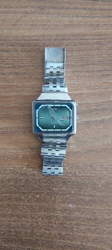 omega qol saatı: İşlənmiş, Qol saatı, Orient — 1