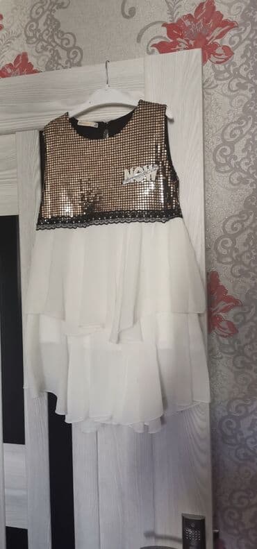 детские вещи на комиссию: 5 - 7 yaşa. yeni kimidi cəmi 1 dəfə qeynilib — 1