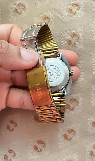 qol sahatları: Rado kişi qol saatı - Korpus: qızılı tonlarda oval/padşah formalı — 2