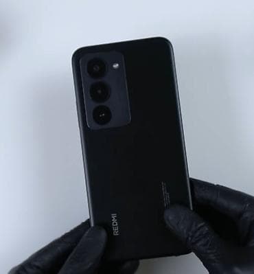 Redmi smartfon - Rəng: qara, mat arxa panel - Ekran: tam ekran ön