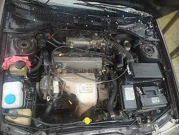 avto rullar: Toyota Carina E: 2 l | 1994 il Sedan — 10