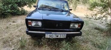 dörd göz maşın: Model: Lada (VAZ) 2107 Kuzov: sedan, tünd mavi rəng Dövlət nömrə — 2