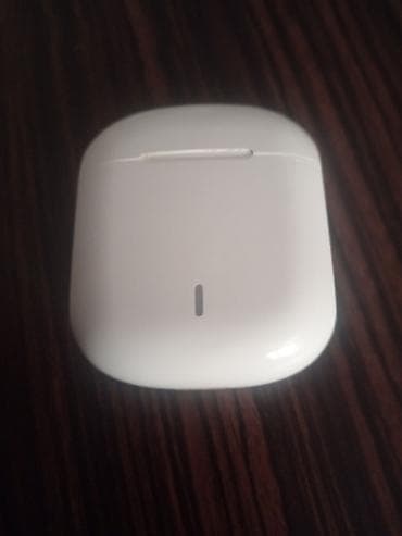 Bluetooth simsiz qulaqlıq dəsti - Kompakt şarj qabı ilə gəlir; ön