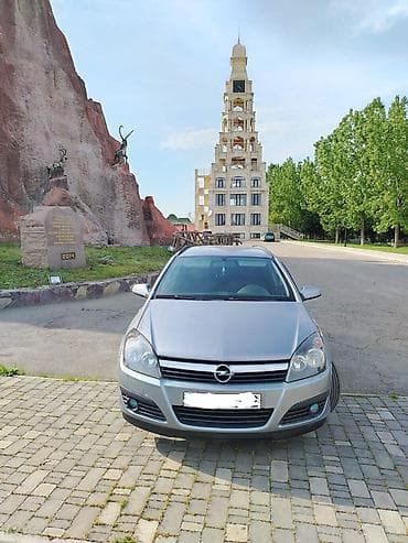 06 karopka: Opel Astra Satilir ili 2007 Qiymet 11000 Maşin ela veziyyetdedir mator — 1