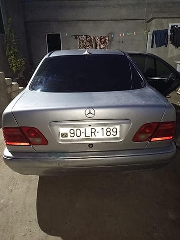 skoda: Mercedes-Benz E-Class: 2.4 l | 1998 il Sedan — 4