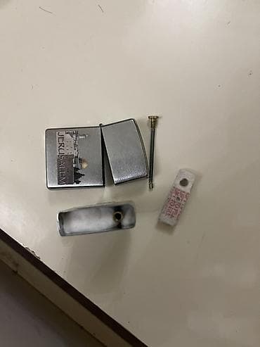 06 sekilleri cekmek: Təptəzədir təkcə qabı yoxdur orjinaldır Məhsul: Orijinal Zippo — 2