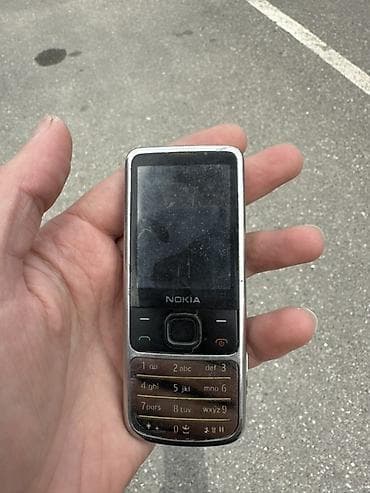 nokia 638: Nokia 6700 Slide, rəng - Gümüşü, Düyməli — 2