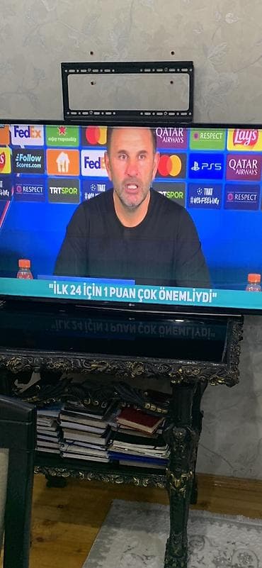 a 32 ekran: LG LED televizor (təxminən 43–50 düym) - Ekran: LED, Full HD/4K — 1