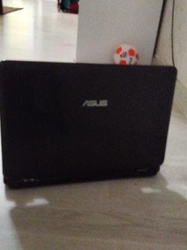 ASUS noutbuk Xüsusiyyətlər: - Ekran: təxminən 14–15.6" parlaq panel -