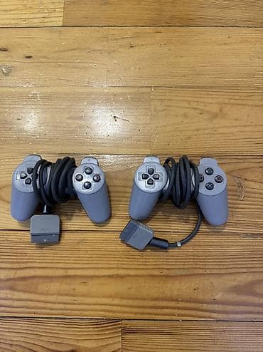 playst: Sony Playstation Fatt en birinci cixan modelin pultlari jostikleri — 2
