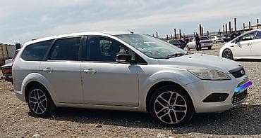 san disk: Ford Focus Wagon – gümüşü rəng, universał kuzov Xüsusiyyətlər: - — 6