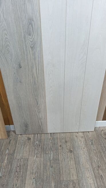 Ламинат: Məhsul: Laminat döşəmə örtükləri və aksesuarları Təsvir: - Mağazada — 5