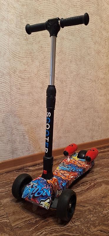 Uşaq skateri YENI KIMI – üçtəkərli, LED işıqlı, musiqili - Rəngli