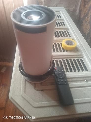 mi box tv: Portativ Proyektor — 2