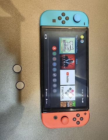 Elektronika: Nintendo Switch konsolu – neon mavi/qırmızı Joy‑Con nəzarətçiləri ilə — 2