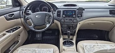 iso oturacaq: Kia Optima: 2.7 l | 2008 il Sedan — 9