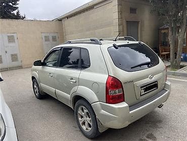 Hyundai: Hyundai Tucson: 2 l | 2009 il Krossover — 2