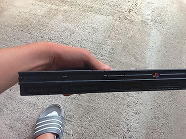 kitab alan: Sony PlayStation 2 Slim (PS2 Slim) oyun konsolu - Model: SCPH-7xxxx — 4