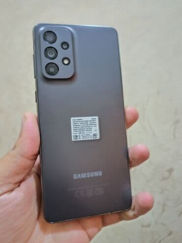 telefon duyməli: Samsung Galaxy A73 5G, 256 GB, rəng - Boz, Düyməli, Sensor, Barmaq izi — 1