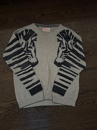 usaqlar ucun ayaqqabilar: Uşaq sviteri – qəhvəyi rəngdə, qollarda və sinədə qara zolaqlı zebra — 1