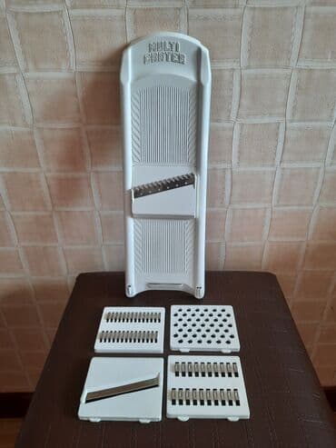 Тёрка новая, многофункциональная, с 5‐ и насадками. Пр-во: Россия lalafo.az -da Тёрка новая, многофункциональная, с 5‐ и насадками. Пр-во: Россия